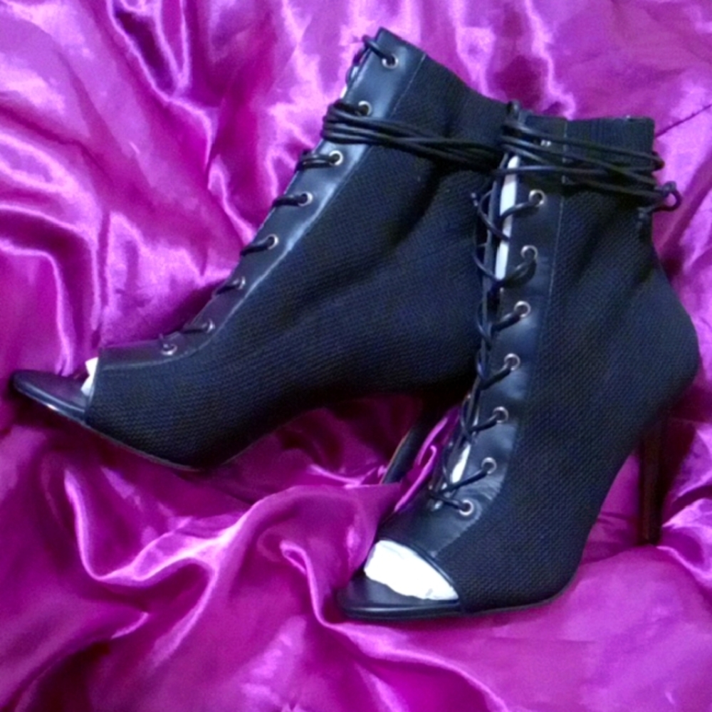 BCBGMaxAzria Black Heeled Boots with Lace-Up Design